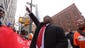 Kendall Fells, organizing director of the Fast Food Forward campaign in New York, demonstrates with fast-food workers and union members calling for an increase in the minimum hourly wage.