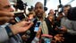 Ben Carson responds to questions from reporters upon