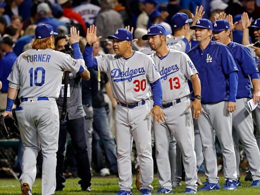 Game 2 in Chicago: Dodgers manager Dave Roberts celebrates