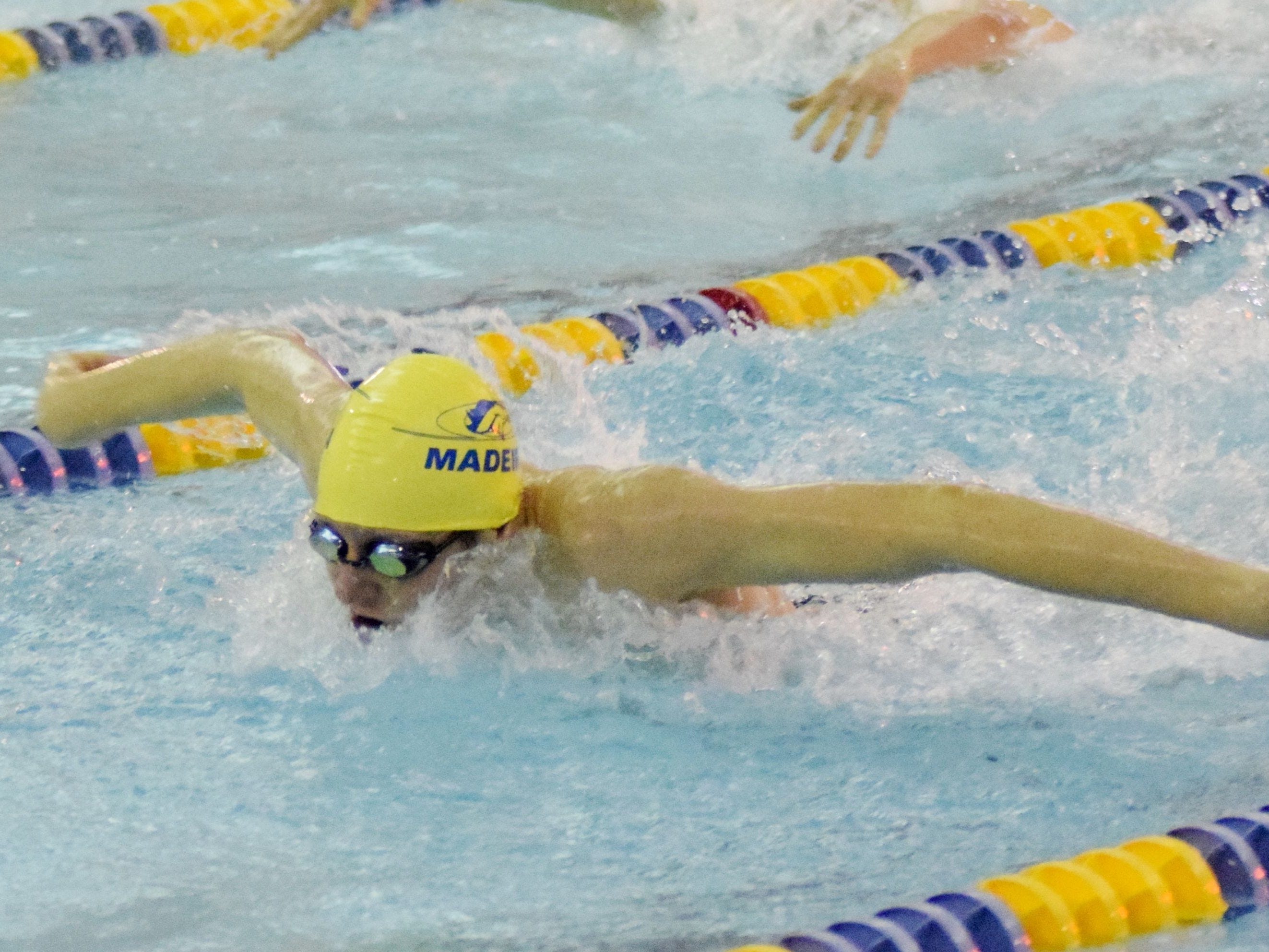 Madeira’s Alex Fortman collected a first-place finish for the Mustangs in the second heat of the boys 100 butterfly at the CHL meet Feb. 7.