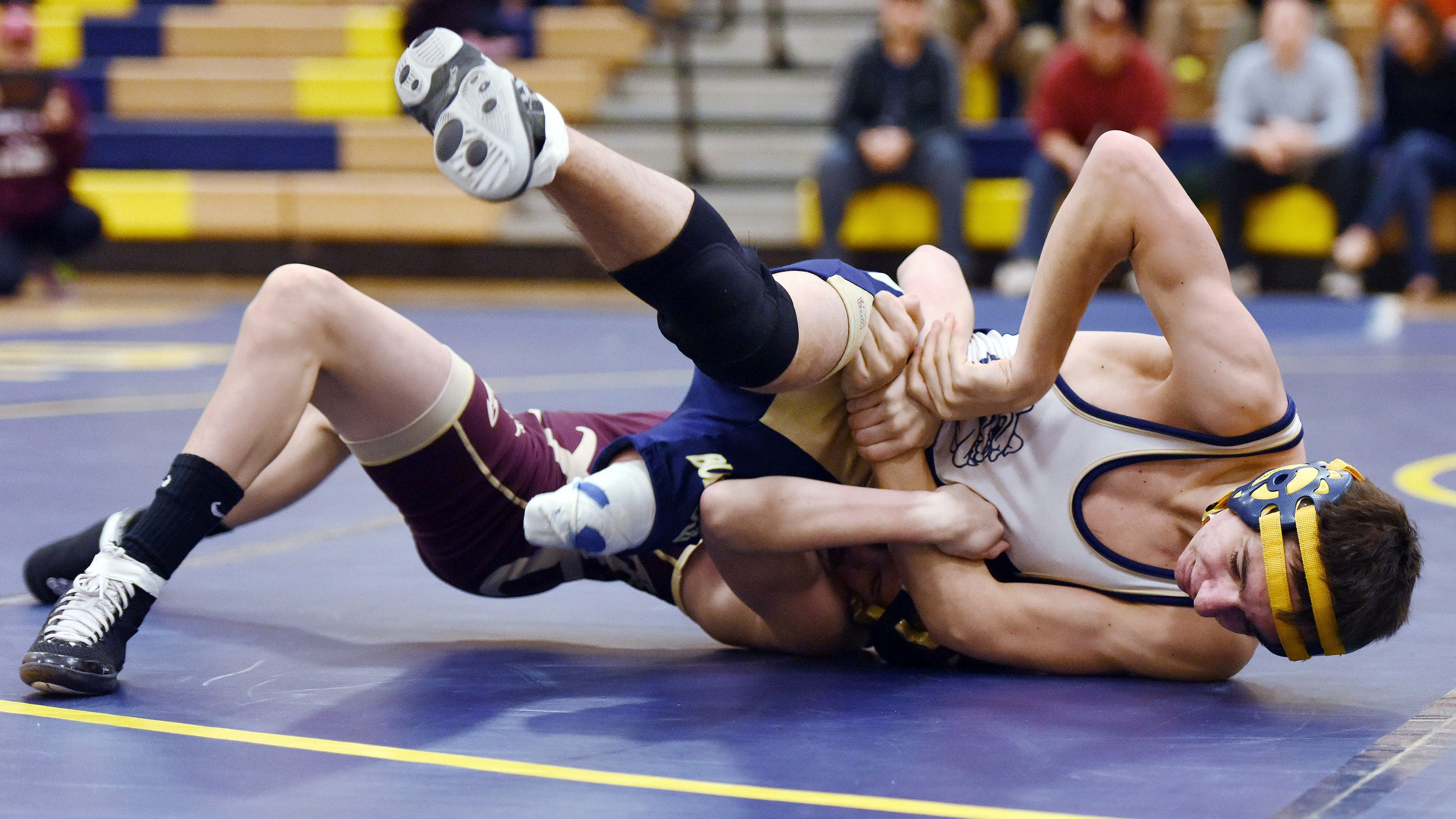 Beacon wrestler competes on one leg after beating cancer