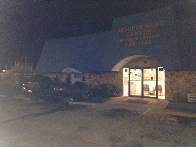 Two women were hurt overnight when their car landed upside down in the parking lot of the Achievement Center for Early Learning building on Busch Blvd.