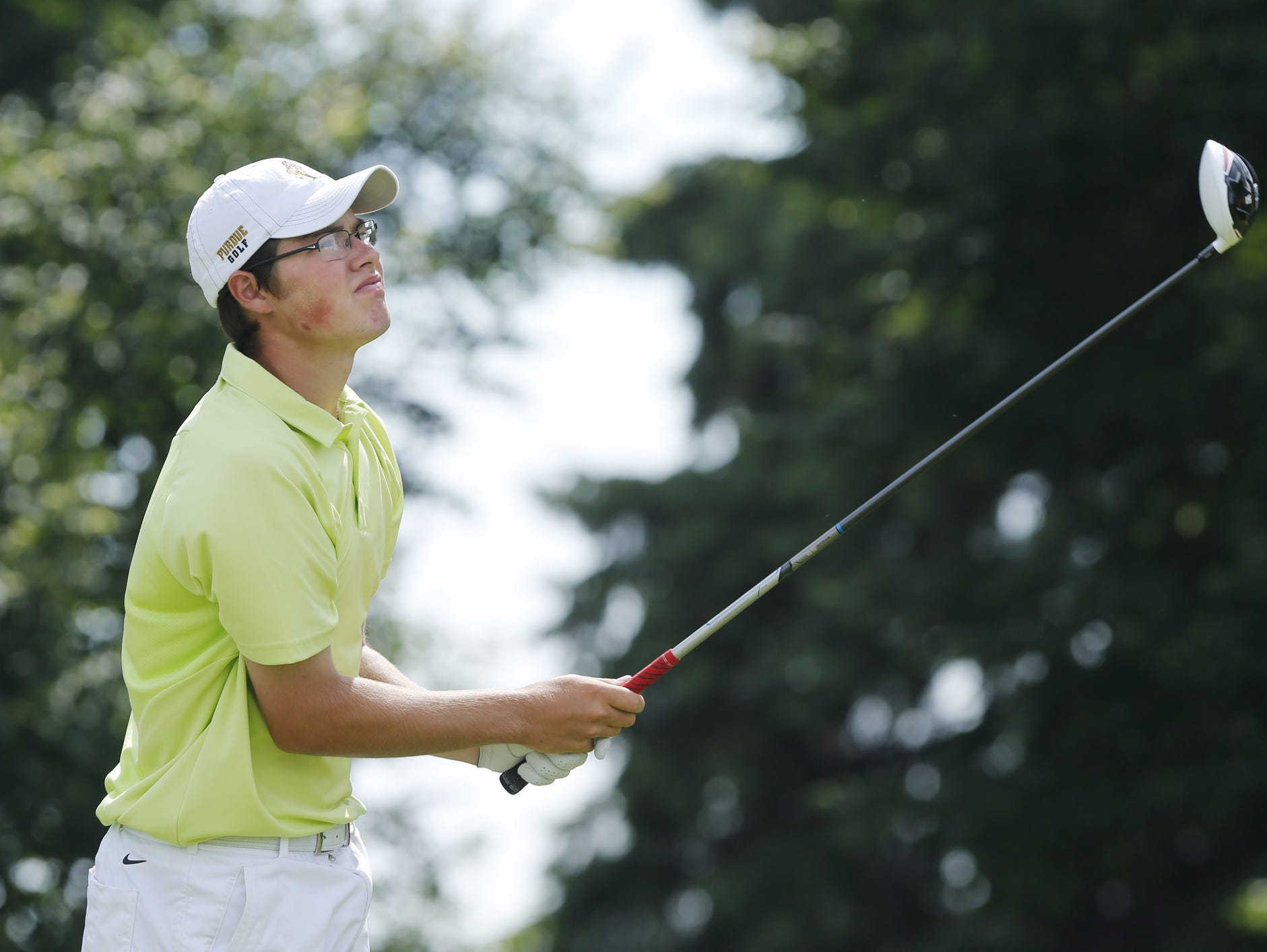 Harrison's Cole Bradley watches his drive at the par four at No. 4 during the golf regional Wednesday, June 10, 2015, at Battle Ground Golf Club.