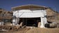 A protective cover shields the entrance of the tomb on Aug. 31.