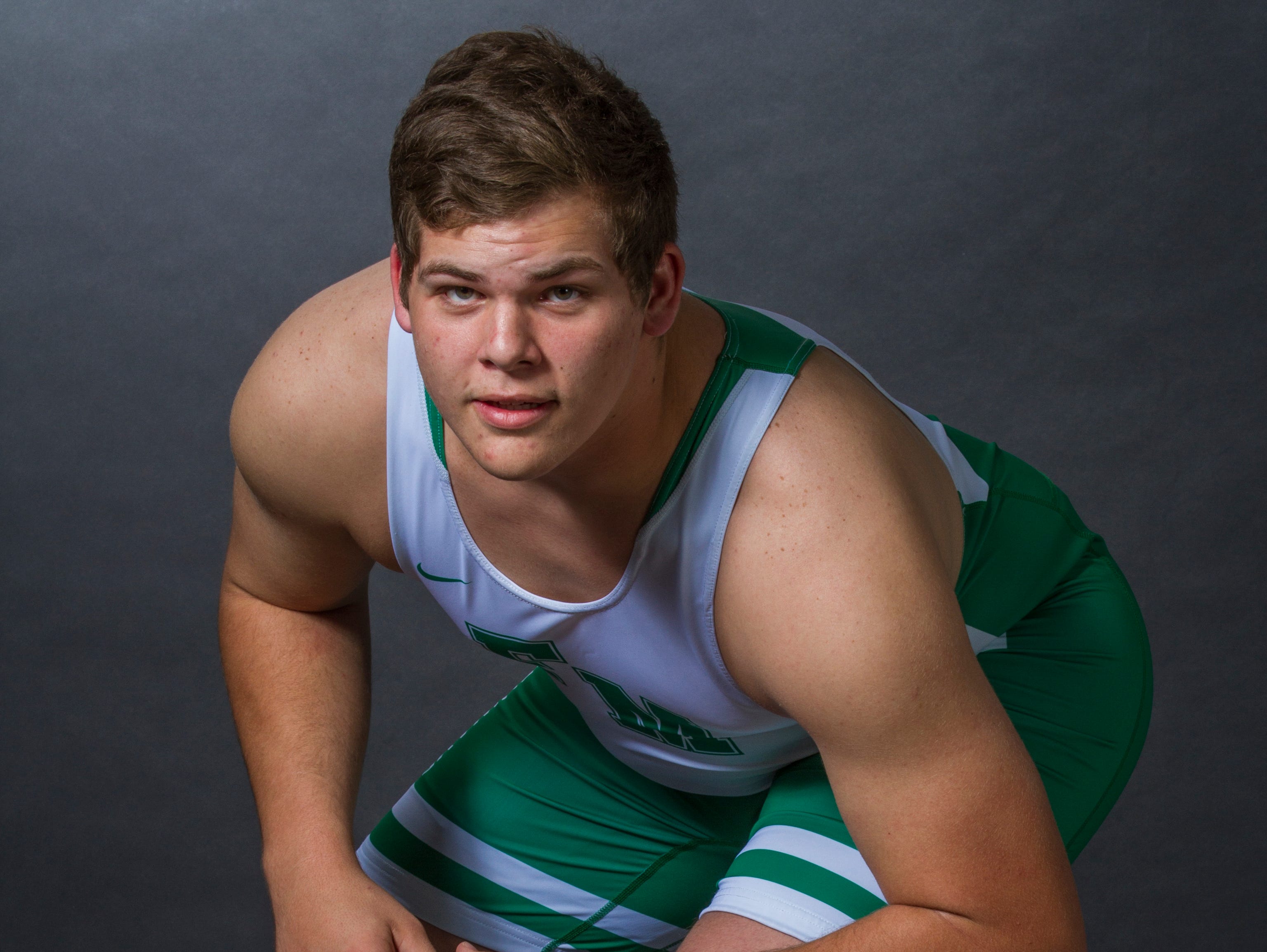 Mike Delago, 18, is a senior wrestler at Fort Myers High School.