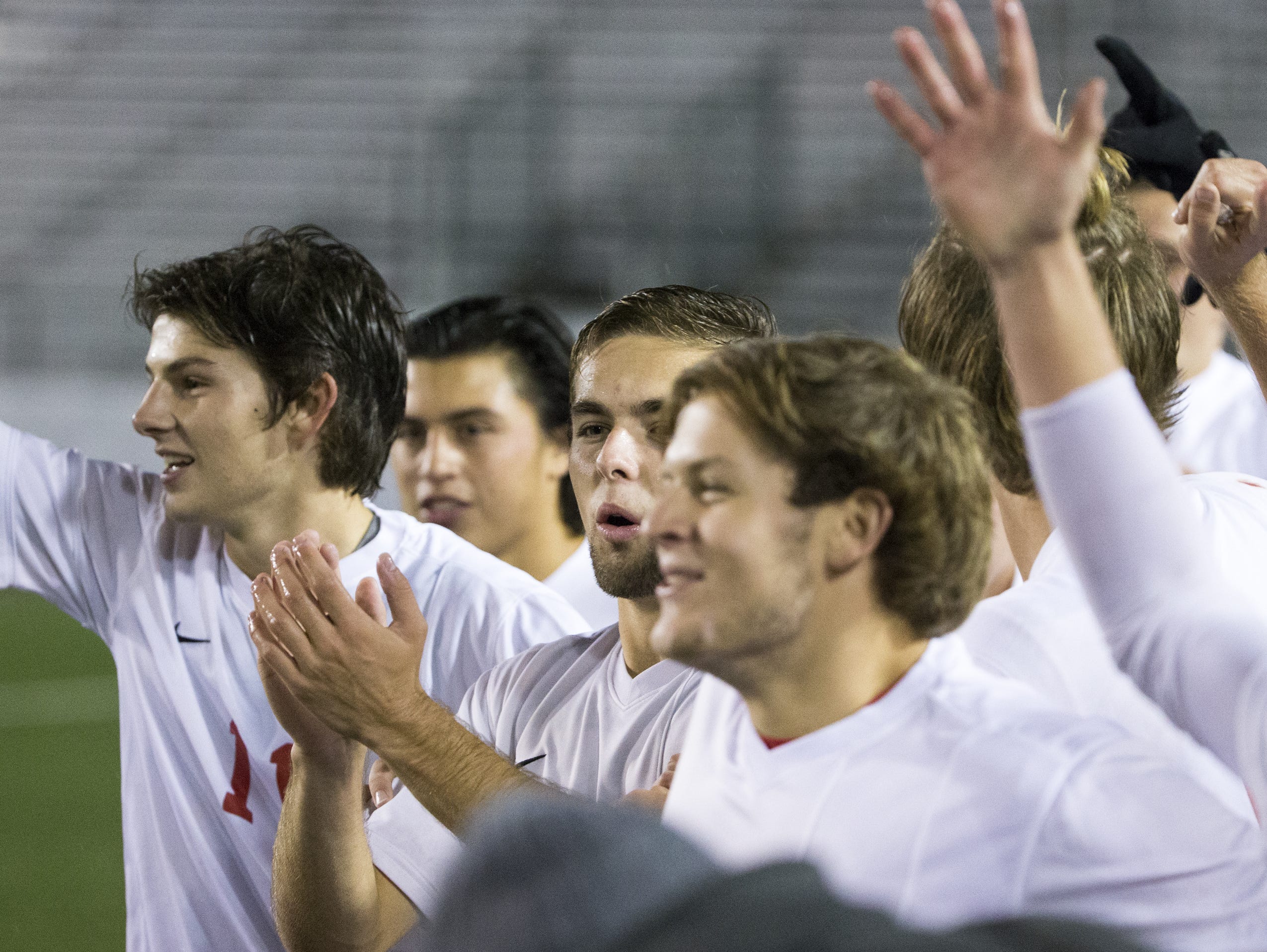 Center Grove High School players cheer their state title, IHSAA Boys Class 2A State Soccer Finals, won by Center Grove High School 4-0 over Harrison (West Lafayette) High School, Michael A. Carroll Track & Soccer Stadium, IUPUI, Indianapolis, Saturday, Oct. 31, 2015.