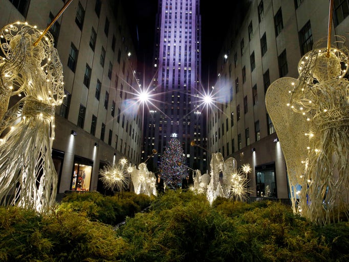 The Rockefeller Center Christmas tree can be seen through