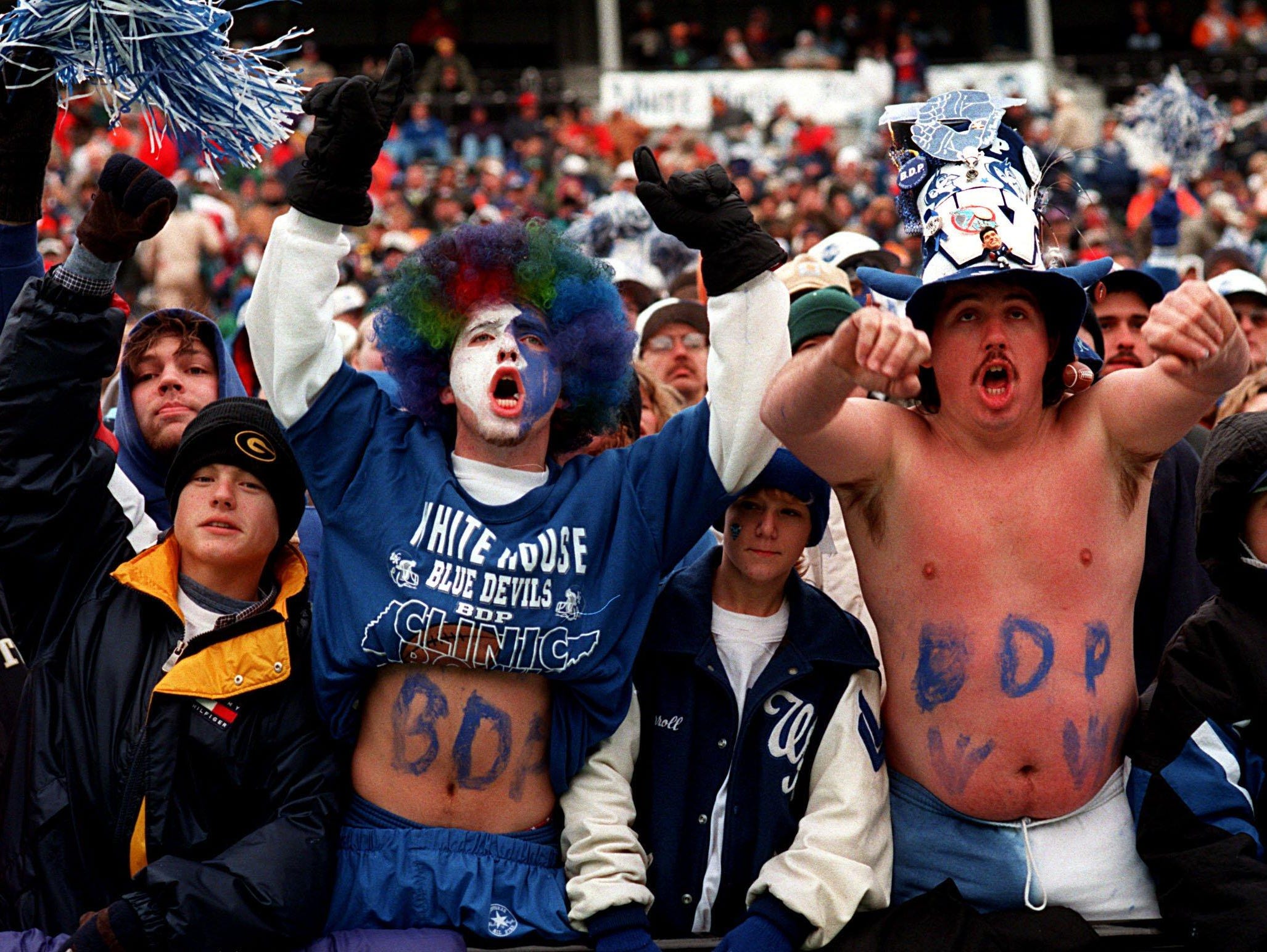 White House fans cheer on their team during a 1990s state championship game.