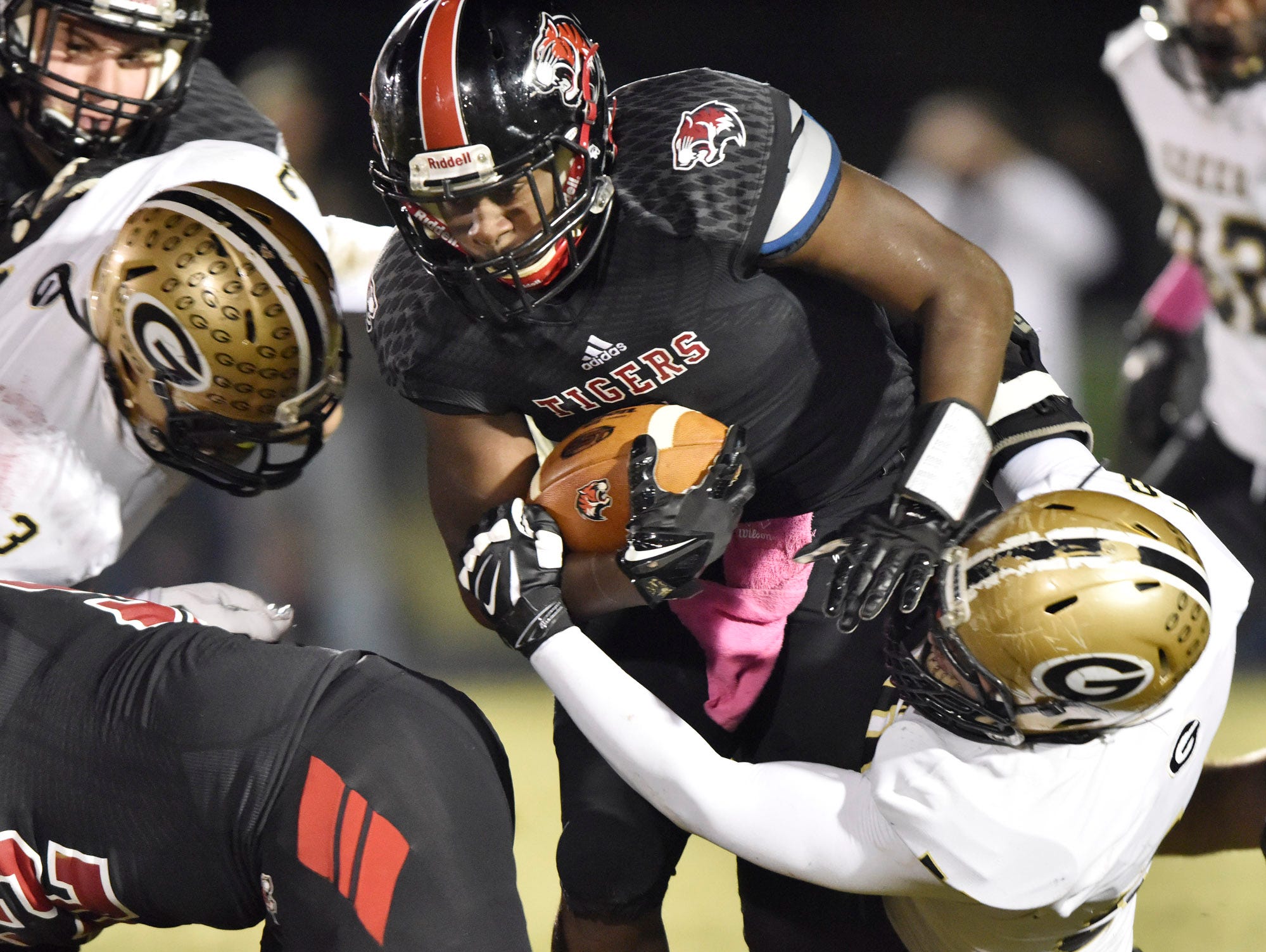Blue Ridge's Vonta Jenkins (1) is caught by Greer's Quantavious Cohen (3) and Korey Styles (58).