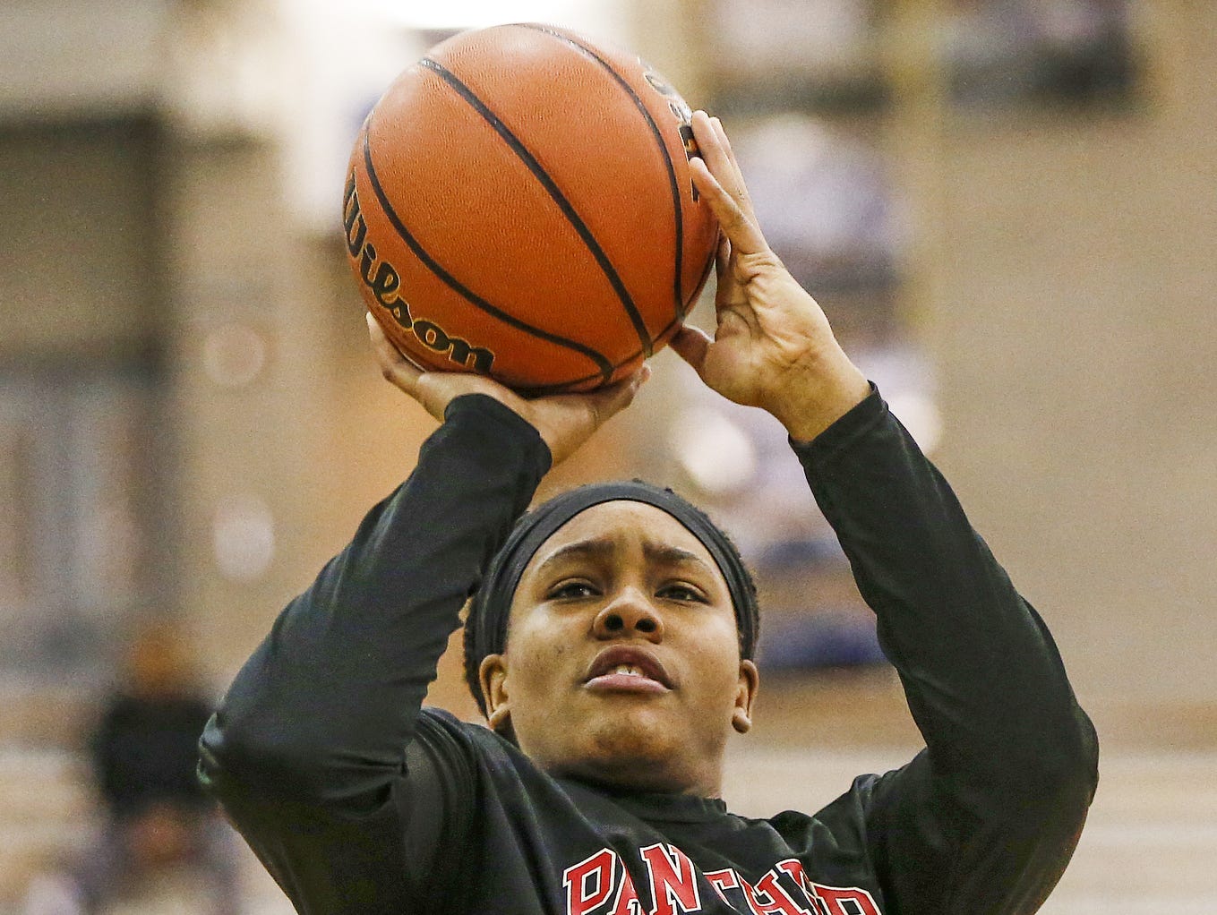 North Central Panthers' Ajanae' Thomas (34) warms up before the Panthers' game at Carmel High School on Dec. 16, 2016.