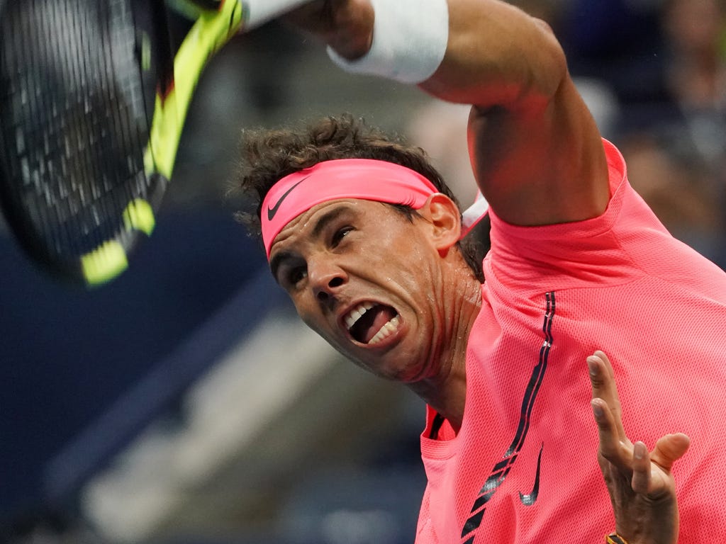 Rafael Nadal serves to Dusan Lajovic in Ashe Stadium on Day 2 at the USTA Billie Jean King National Tennis Center in New York.