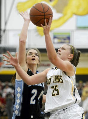 Red Lion's Courtney Dimoff goes to the hoop against Dallastown's Katie McGowan during a girls basketball game Friday at Red Lion Area Senior High School. Dimoff had a game-high 21 points. (Kate Penn -- GameTimePA.com) ID=75277050 ID=75277050