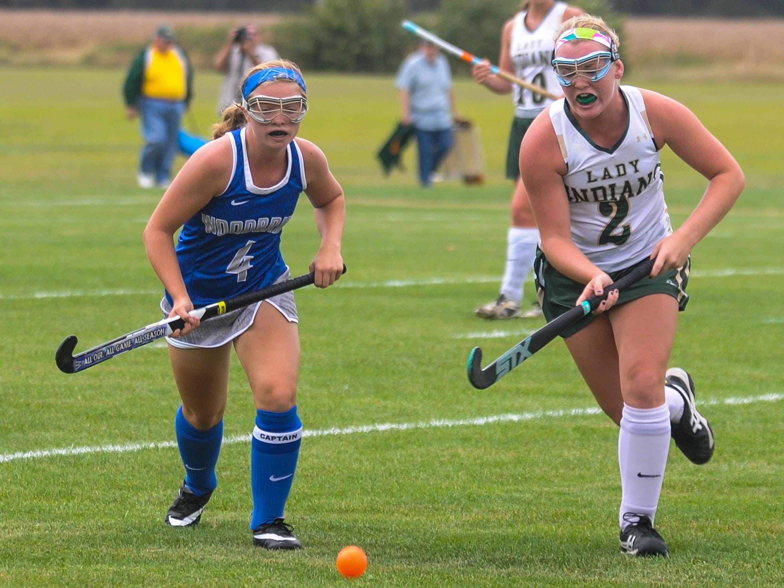 Indian River's Callie McDowell, right, works up field against Woodbridge on Tuesday afternoon in Dagsboro.