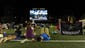 Vanderbilt fans enjoy watching their baseball team take on Virginia during a College World Series watch party at Dudley Field Wednesday June 25, 2014, in Nashville, Tenn.