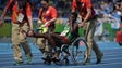 Abdi Waiss Mouhyadin of Djibouti is helped off the