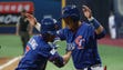 March 8: Outfielder Chih-Hao Chang (L) of Chinese Taipei