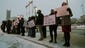 Protestors rally in front of the Fox Theater before