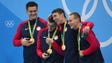 The team of Nathan Adrian, Ryan Held, Michael Phelps