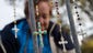 Lupe Cantu, of McAllen Valley, Texas, hangs rosary
