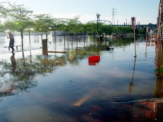 Phil Martin walks along First Avenue in downtown Nashville