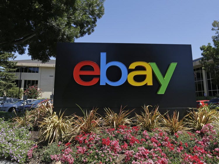 This July 16, 2013 file photo shows an eBay sign at eBay headquarters in San Jose, Calif.