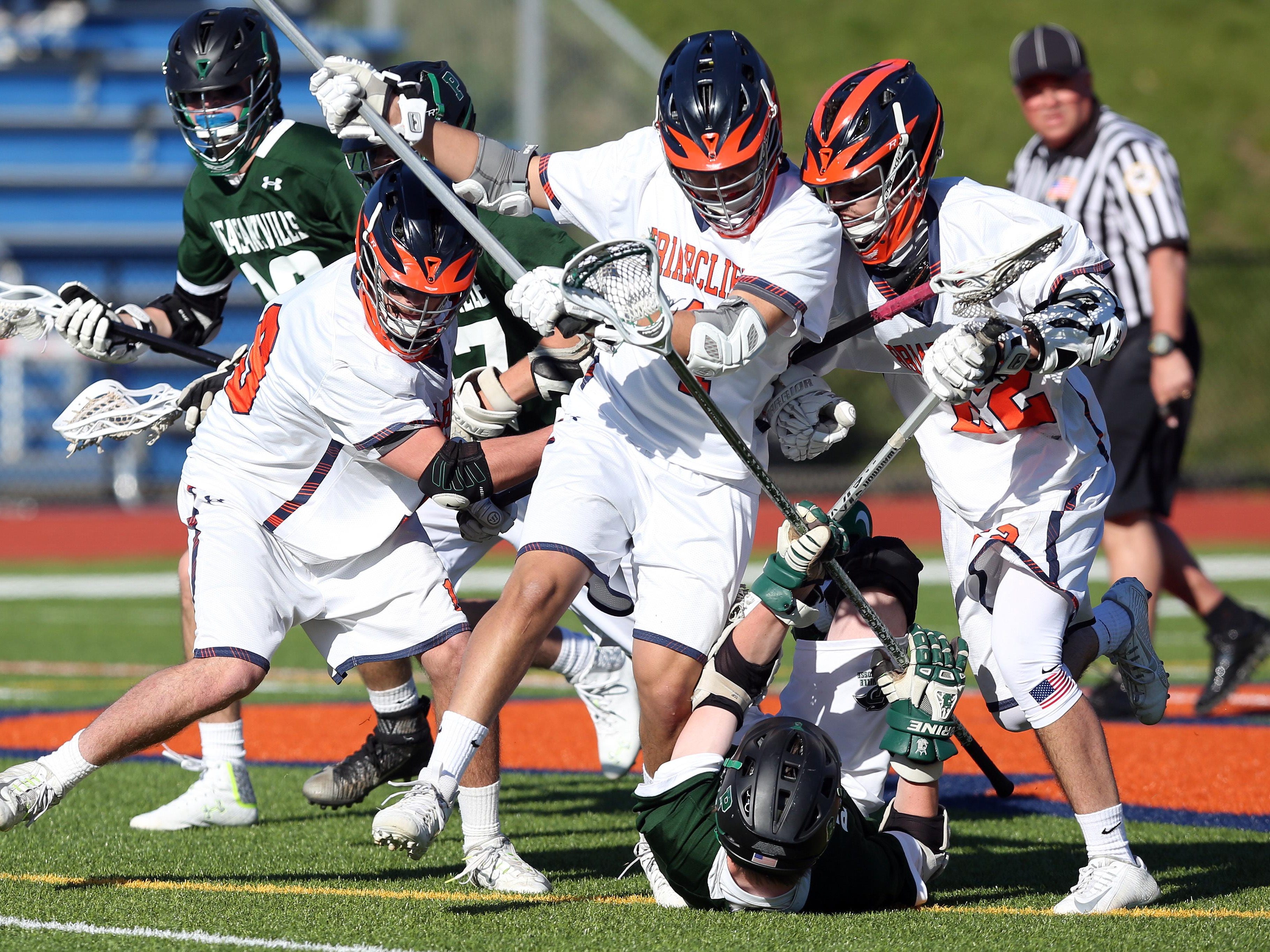 From left, Briracliff's Matt Hausman, Lucas Hoffner and John Plimpton combine to steal the ball away from Pleasantville’s Greg Driscoll during Wednesday’s game.