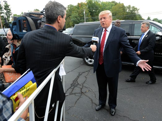 Trump answers a reporter