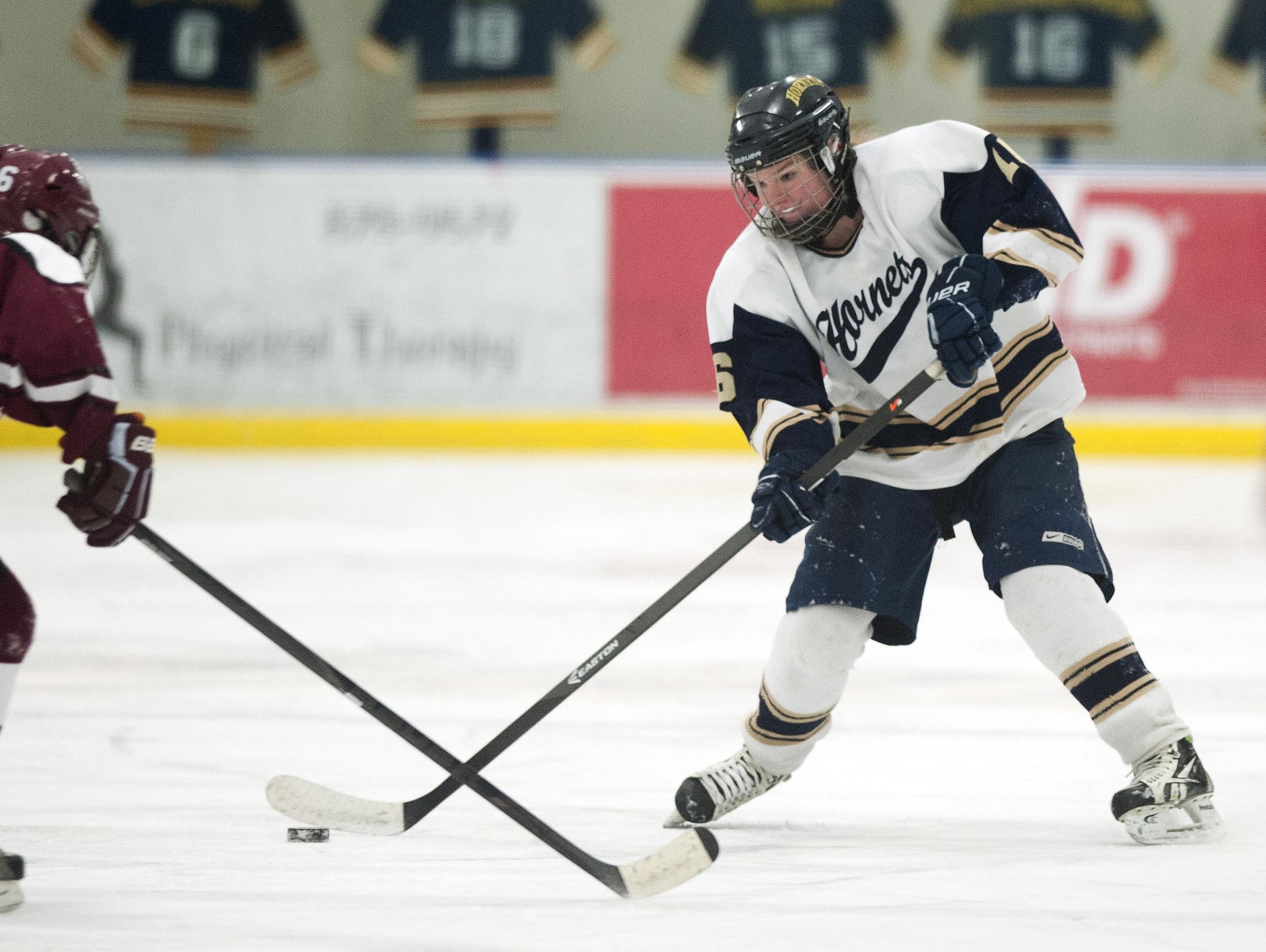 Essex's Avery MacGillivray (16) takes a shot during a girls hockey game between Northfield and Essex at Essex High School last season.