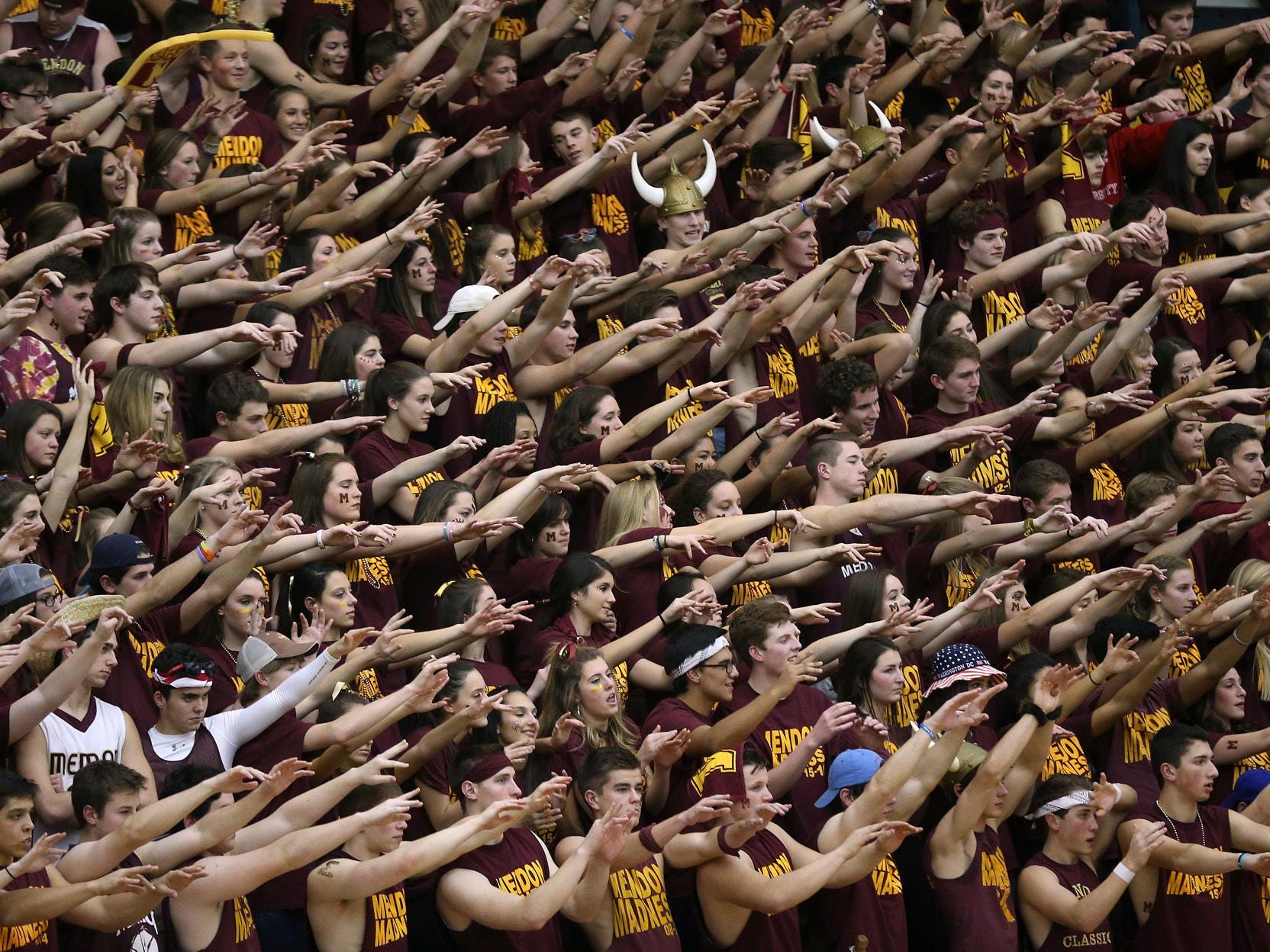 Pittsford Mendon fans show their support during the girls game in the Rainbow Classic in the annual matchup against Pittsford Sutherland.