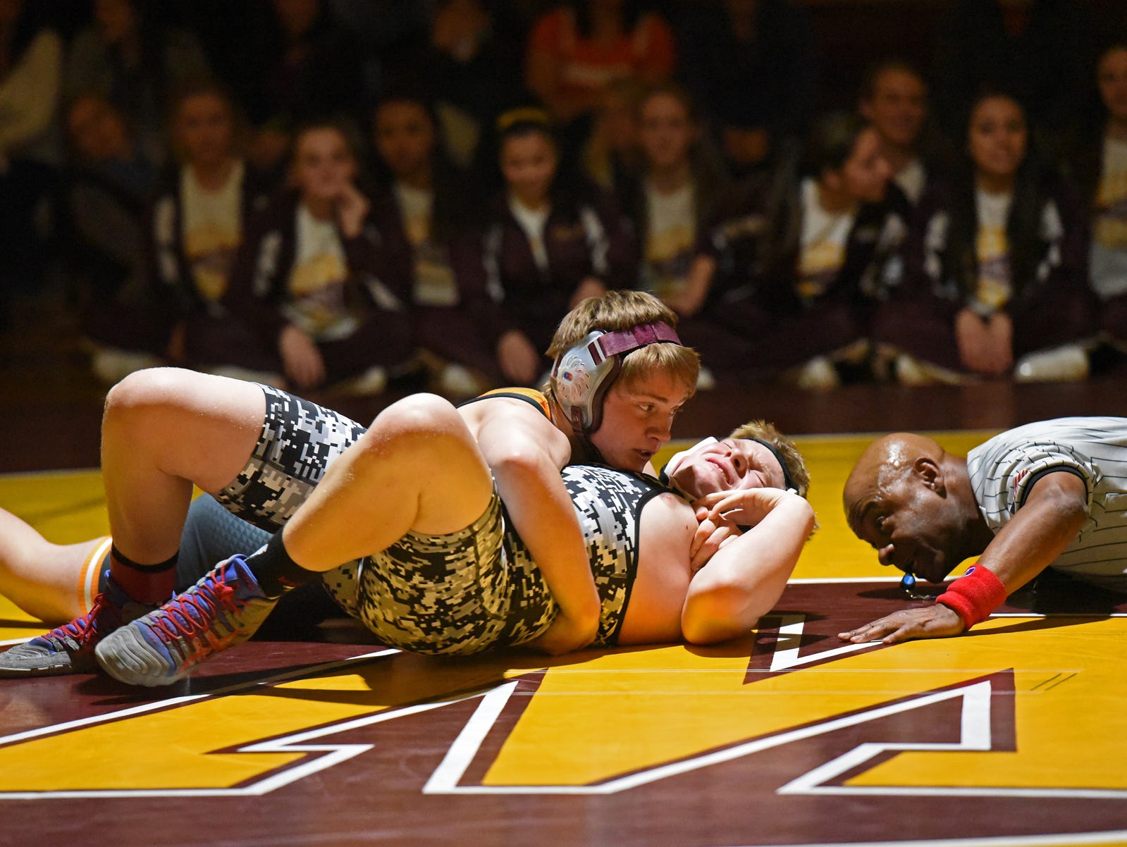 Windsor's 182-pound wrestler Nathan Byant pins his opponent in the first period against Roosevelt on Thursday.