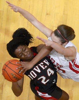 Dover's Alayah Hall drives to the hoop against Cumberland Valley's Kelly Jekot during the PIAA Class AAAA quarterfinal girls' basketball game against Cumberland Valley at Milton Hershey High School in Hershey Friday, March 14, 2014. Dover lost 45-36. Kate Penn -- Daily Record/Sunday News ID=75277364 ID=75277364