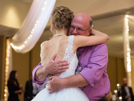 Greta Perske hugs Danny Daniels -- her marrow donor