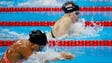 The war of words and gestures between Lilly King (right)