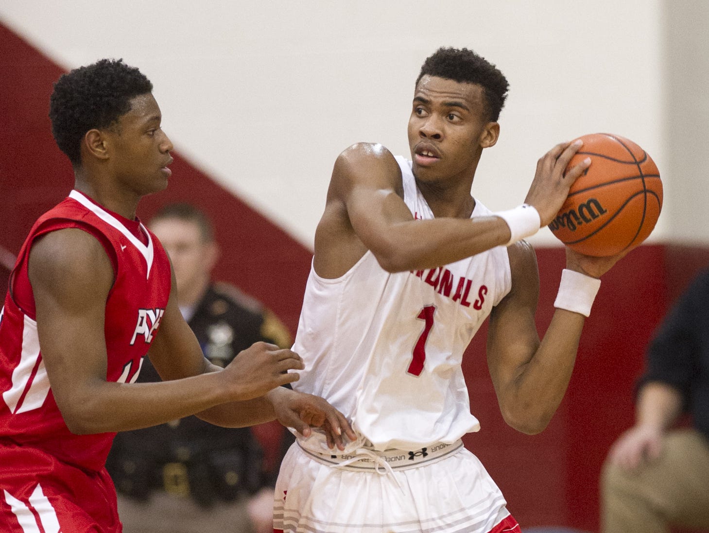 FILE --- Southport High School sophomore Paul Scruggs (1) looks for a teammate for help during the first half of action. Southport High School hosted two semi-final games of the 2015 Marion County Boys Basketball Tournament, Friday, Jan. 16, 2015.