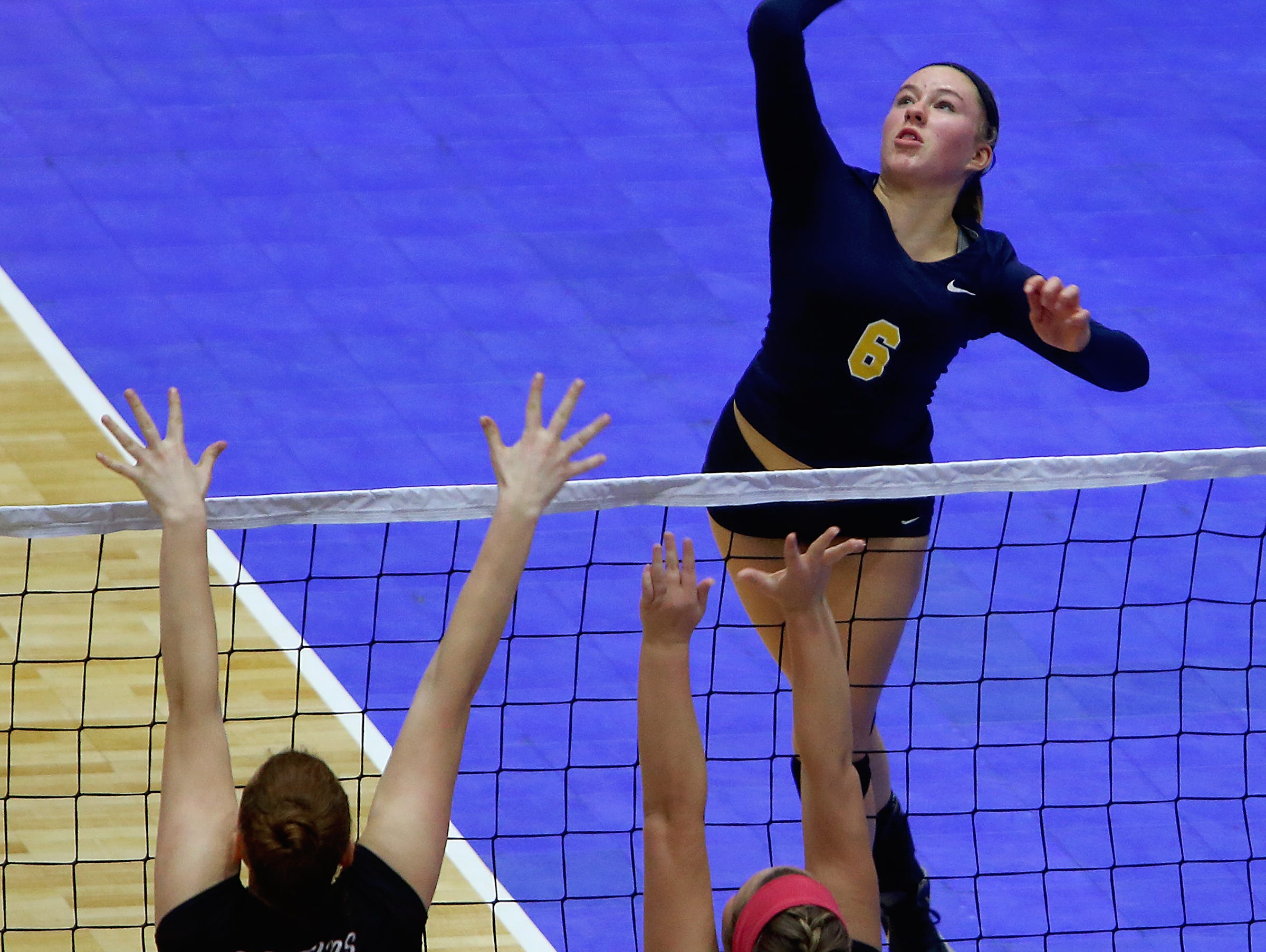 Panas’ Lauren Feeley goes up for a spike during a two-game loss to Burnt Hills at the state volleyball championships at the Glens Falls Civic Center on Saturday, Nov. 21, 2015.
