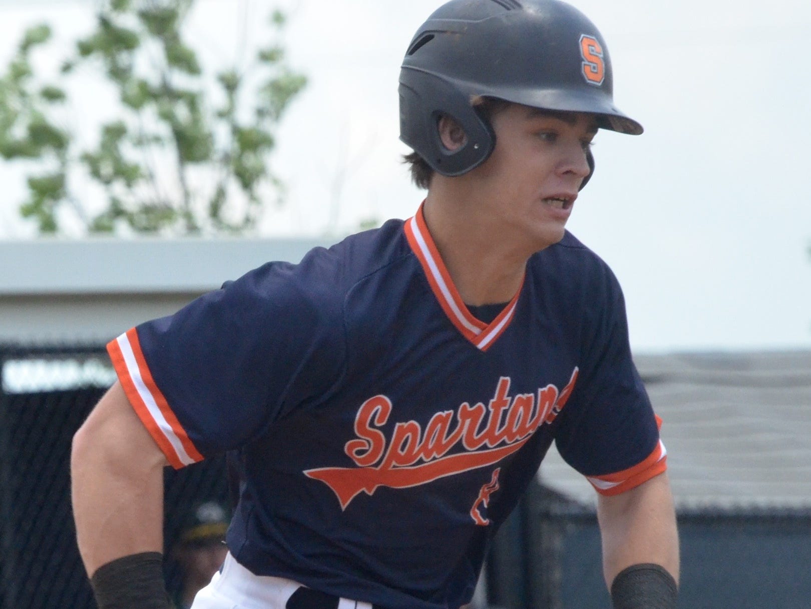 Summit's Wil Dalton legs out a first-inning single.