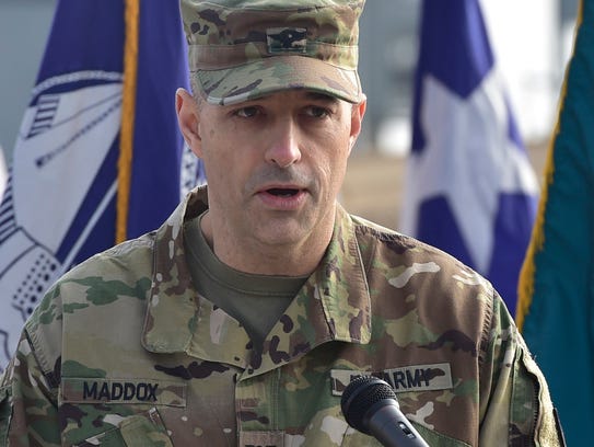 Col. Deacon Maddox speaks during a groundbreaking ceremony