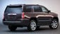 Tailgate mechanism is intended to make it easier to raise, lower the gate and take up less space inside on the 2015 GMC Yukon Denali. The big SUV goes on sale first quarter next year.
