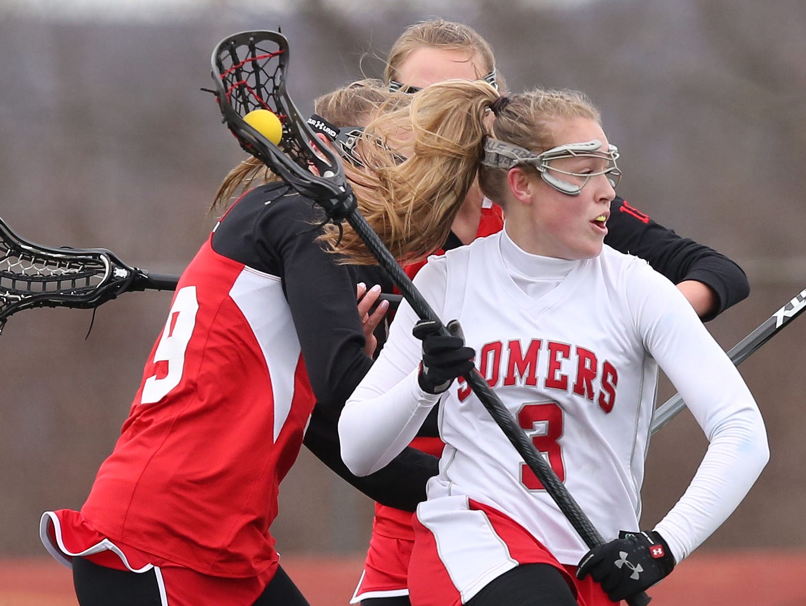 Somers' Gabby Rosenzweig (3) drives to the goal against Fox Lane during a girls lacrosse game at Somers High School April 8, 2016. Somers won the game 15-12.