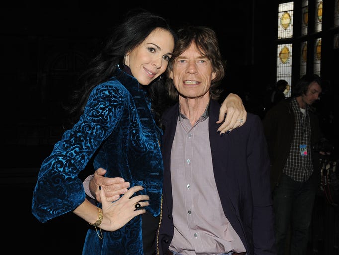 NEW YORK, NY - FEBRUARY 16: Designer L'Wren Scott and musician Mick Jagger pose at the L'Wren Scott Fall 2012 fashion show during Mercedes-Benz Fashion Week at the Desmond Tutu Center on February 16, 2012 in New York City. (Photo by Slaven Vlasic/Getty Images)
