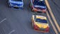 Joey Logano leads Jeff Gordon and Jimmie Johnson during