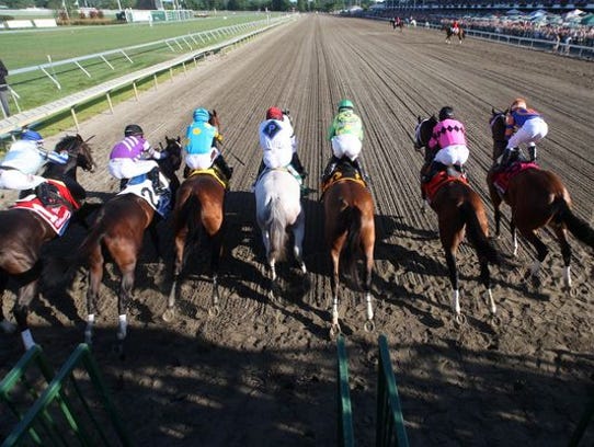 Horses break from the starting gate during the $1.75-million