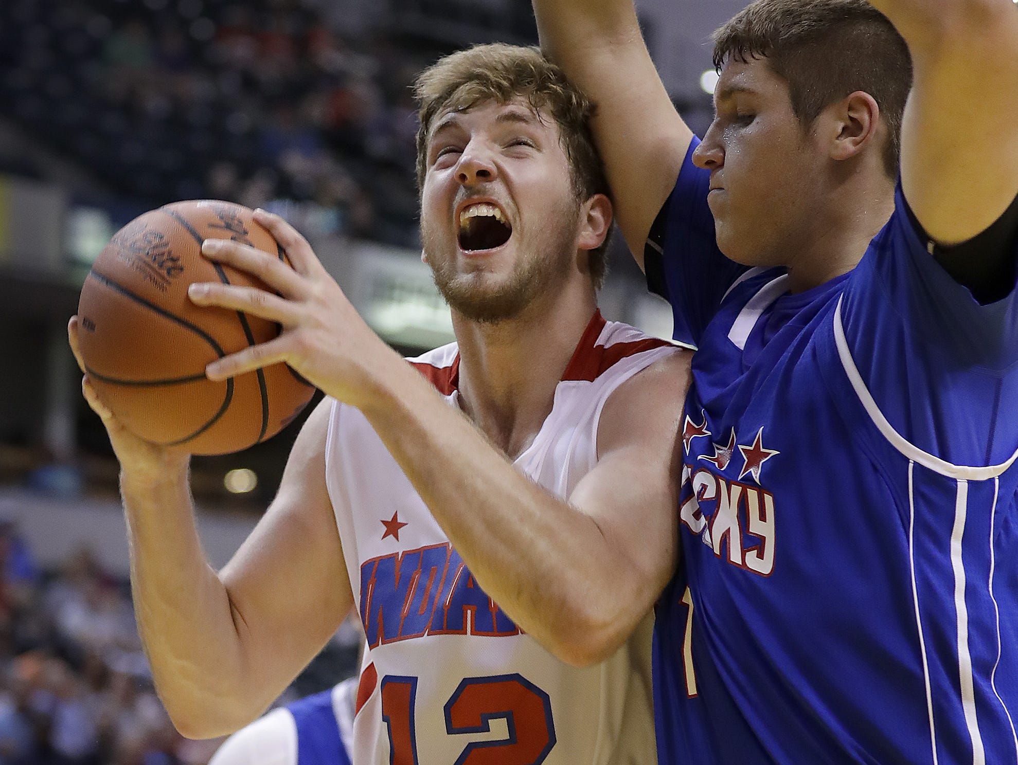 Joey Brunk made it his mission to be a major college basketball player. On Saturday, Indiana's Brunk (12) was fouled by Kentucky's Caleb Taylor in their All-Stars game.