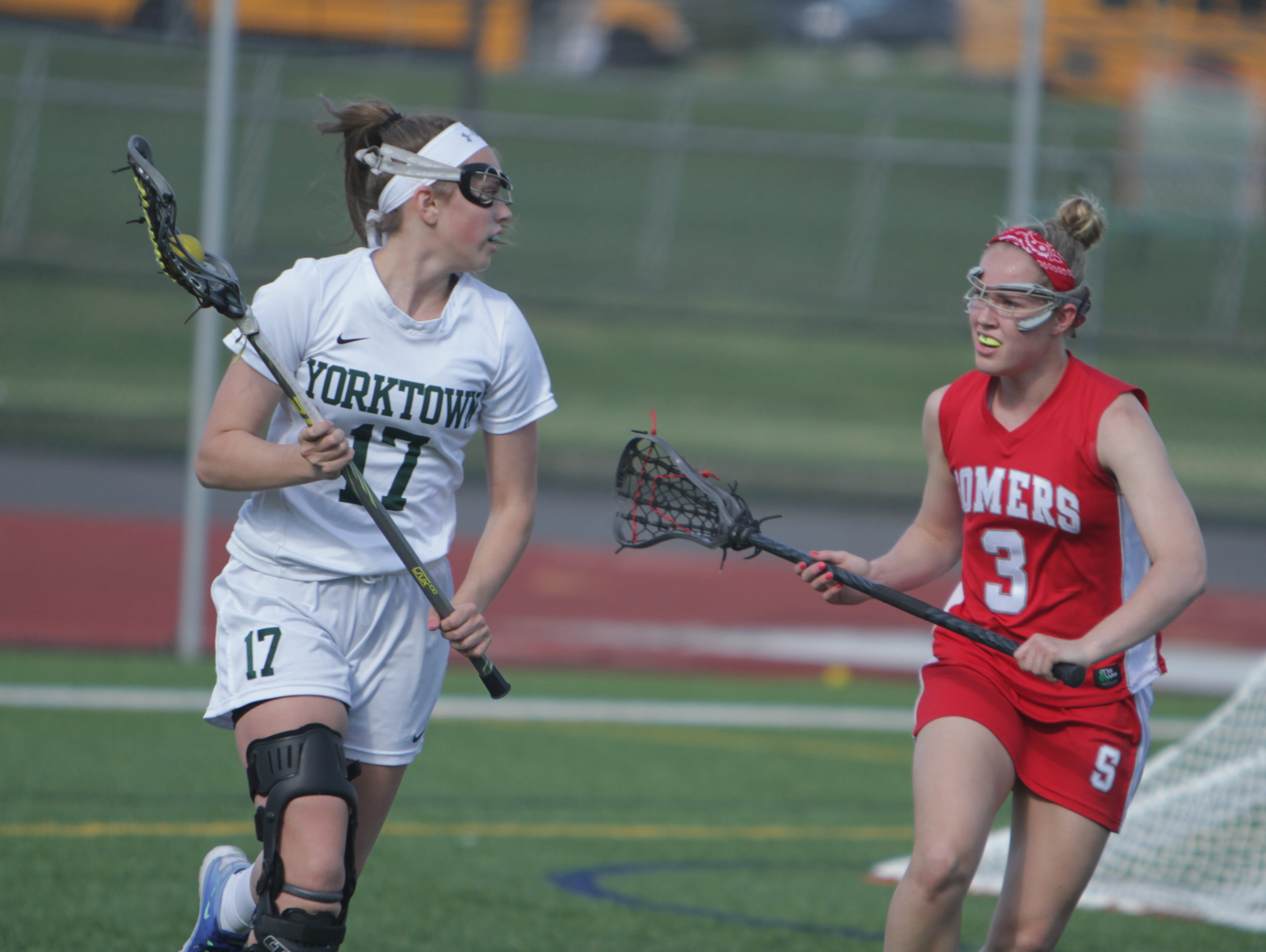 Action during a Section 1 girls lacrosse game between Yorktown and Somers at Yorktown High School on Thursday, April 21st, 2016. Somers won 11-10.