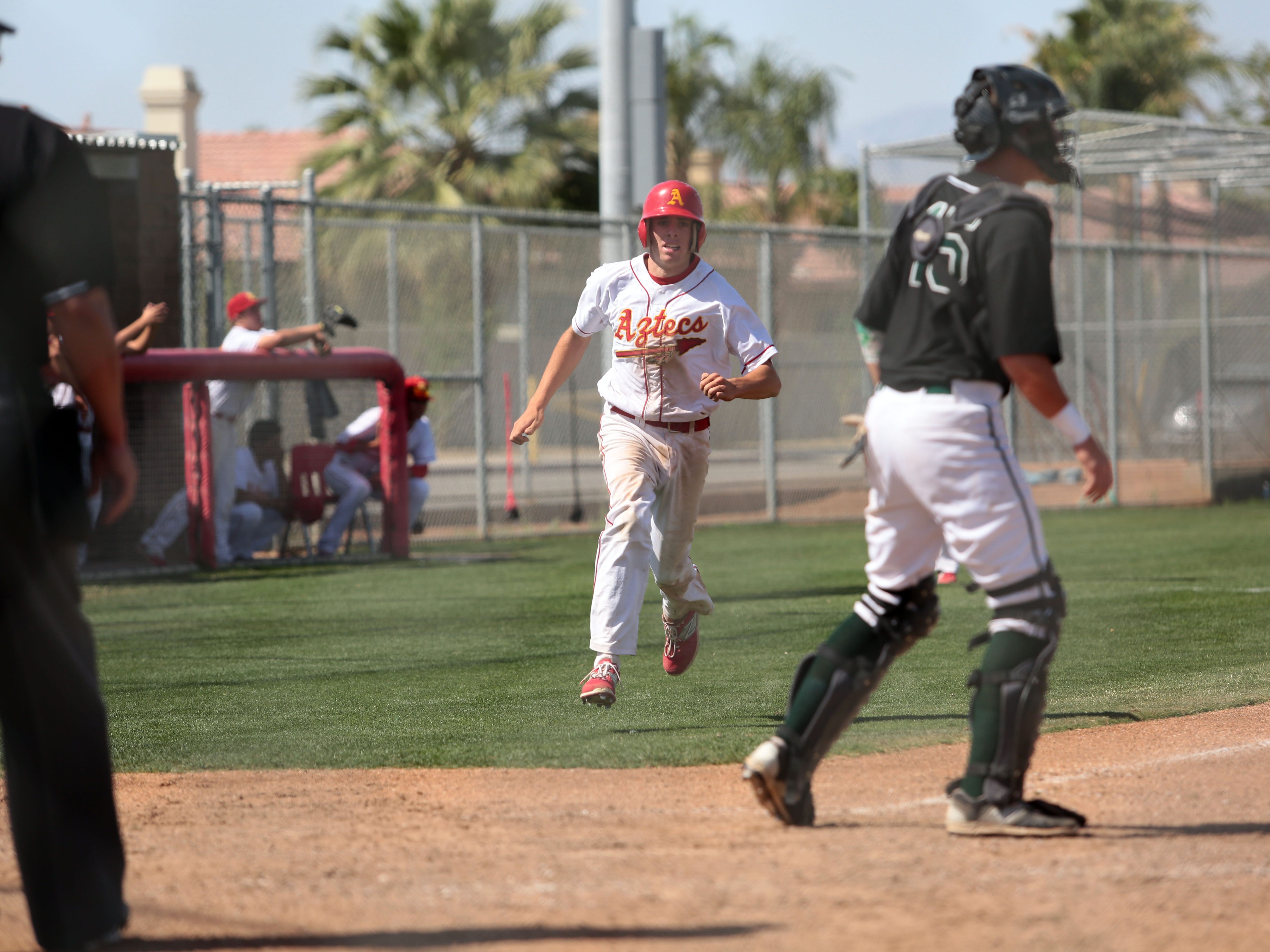 Palm Desert's Andrew Bash makes it home against Royal in the title game of the 53rd annual Coachella Valley Rotary Baseball Classic on Thursday afternoon.