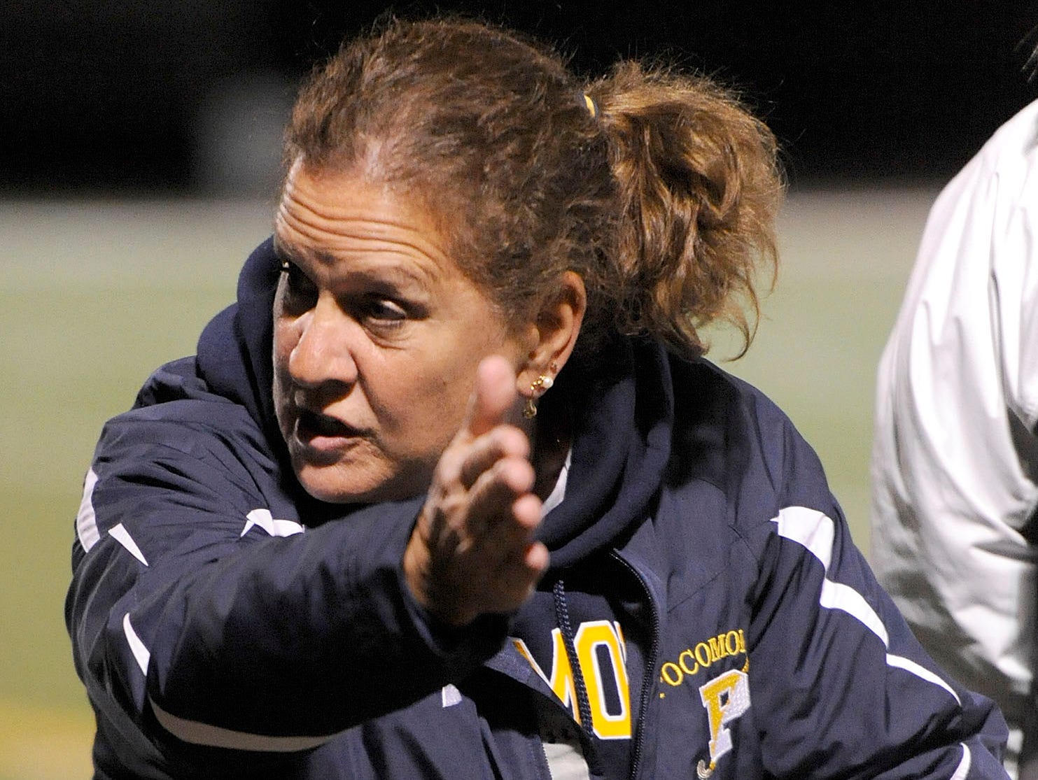 Pocomoke head coach Susan Pusey coaches her team during halftime of a state semifinal field hockey game against Fallston Monday, Nov. 3, 2014 in Annapolis.