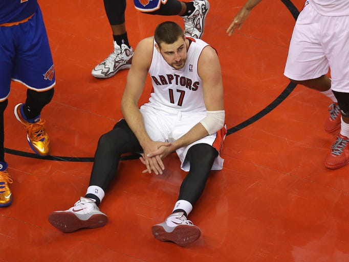 April 11, 2014: Raptors center Jonas Valanciunas reacts to being called for a travel after he slipped against the Knicks.