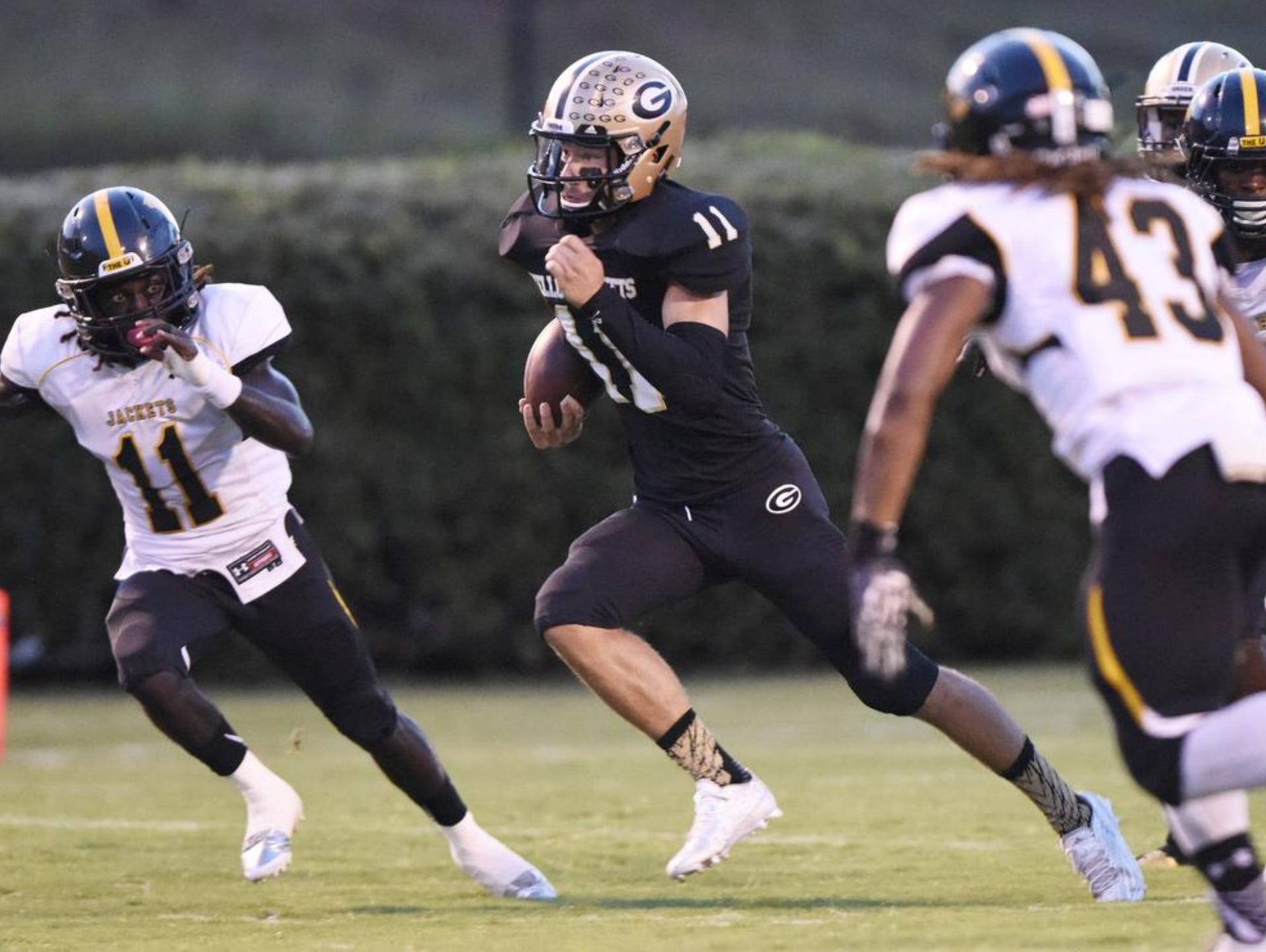 Senior quarterback Mario Cusano (11) and the Greer Yellow Jackets will host the Union County Yellow Jackets in a Class AAA second-round game Friday night.