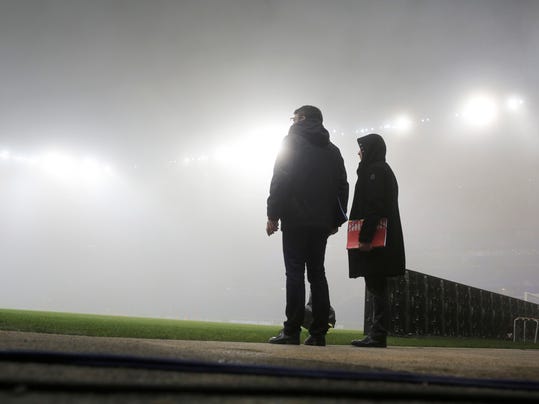 Mist covers the Lyon stadium prior to the Group H Champions League soccer match between Lyon and Sevilla in Decines, near Lyon, France, Wednesday, Dec. 7, 2016. (AP Photo/Laurent Cipriani)