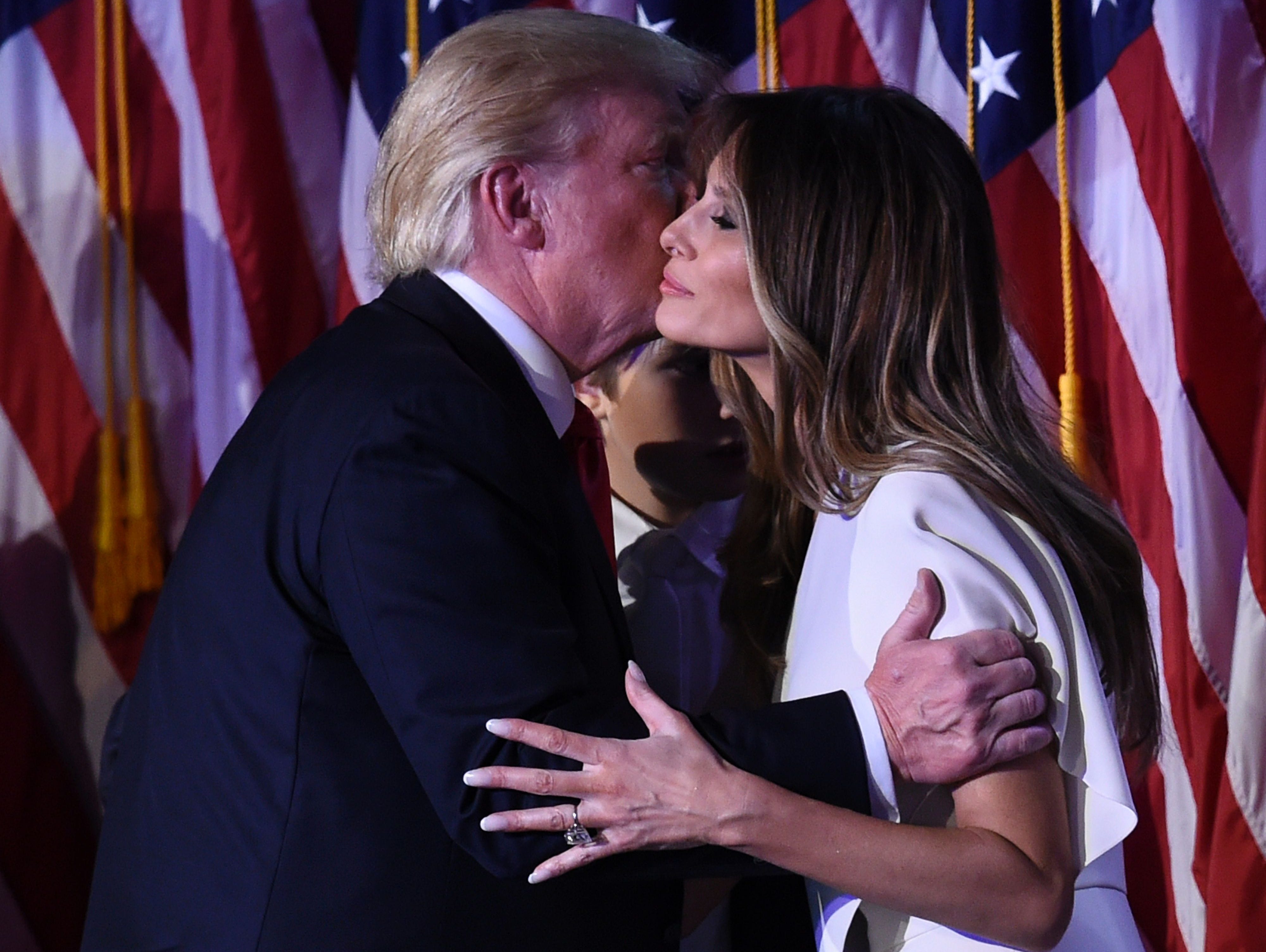 President-elect Donald Trump greets wife Melania after speaking at the New York Hilton Midtown in New York on November 8, 2016.